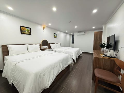 Signature Quadruple Room, 2 Queen Beds | Select Comfort beds, minibar, individually decorated