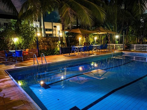 Outdoor pool, pool umbrellas, sun loungers