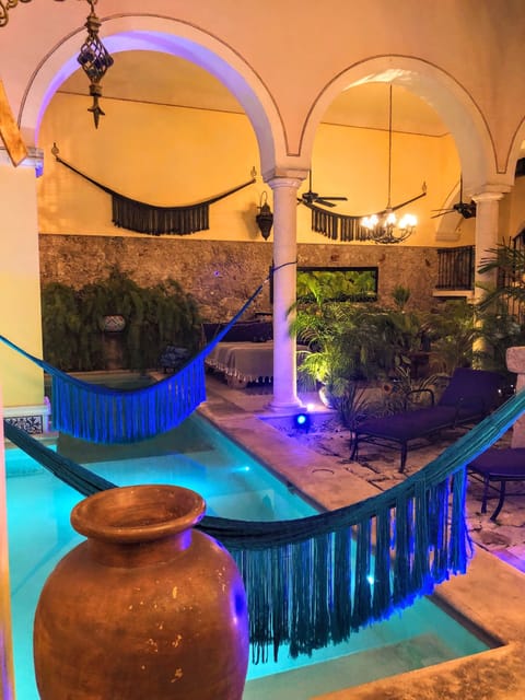 Looking across the beautiful hammocks  to the daybed in the sitting area