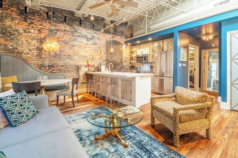 80 LEX: Eclectic Industrial Apt 203  in Historical, one designated parking space is included. The parking space is located about a block away.