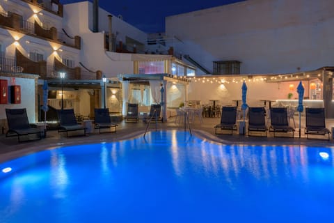 Outdoor pool, open 9:00 AM to 9:00 PM, pool umbrellas, sun loungers