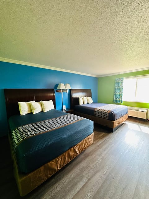 Standard two queen beds | Desk, iron/ironing board, cribs/infant beds, rollaway beds