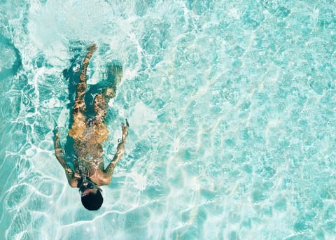 Outdoor pool, open 9:00 AM to 10:00 PM, cabanas (surcharge)