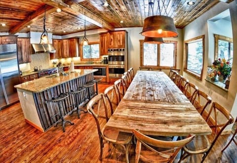 A chef's dream gourmet kitchen with high-end appliances and large eat-in kitchen