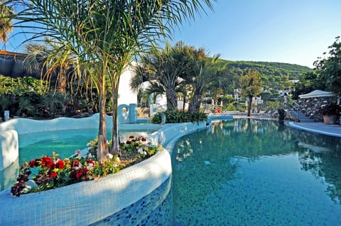 4 outdoor pools, open 9:00 AM to 7:30 PM, pool umbrellas, sun loungers