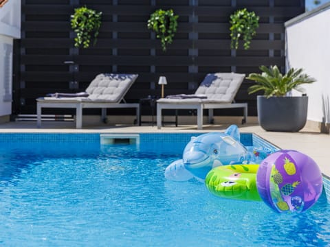 Blue, Swimming Pool, Outdoor Furniture, Furniture, Composite Material, Flowerpot, Leisure, Resort, Houseplant, Hotel