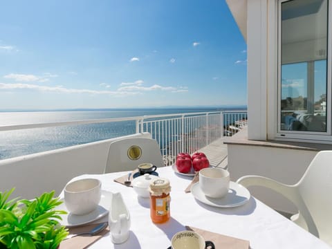 Sky, Water, Tableware, Furniture, Property, Building, Table, Azure, Window, Cloud