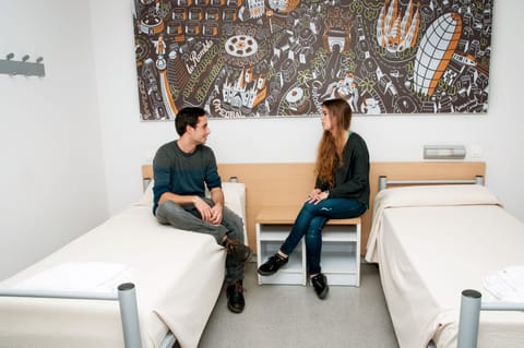 Blackout drapes, soundproofing, free WiFi, bed sheets