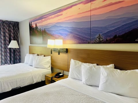 Suite, 2 Queen Beds, Non Smoking | Bathroom | Combined shower/tub, deep soaking tub, hydromassage showerhead