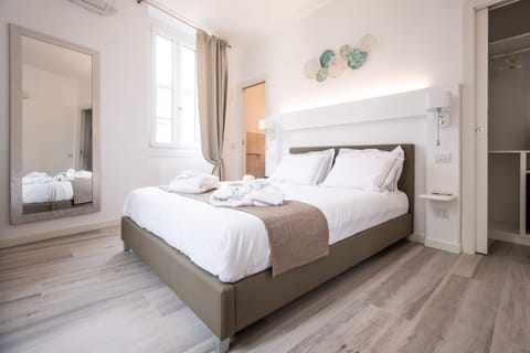 Premium bedding, down comforters, memory foam beds, minibar