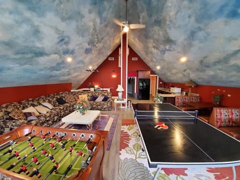 3rd floor game room with kitchen and booths.  Queen size sleeper sofa
