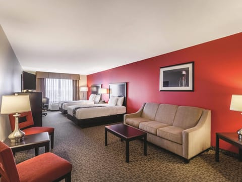 Deluxe Suite, 2 Queen Beds, Non Smoking | Premium bedding, down comforters, desk, blackout drapes