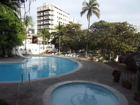 Outdoor pool, open 9 AM to 9 PM, sun loungers