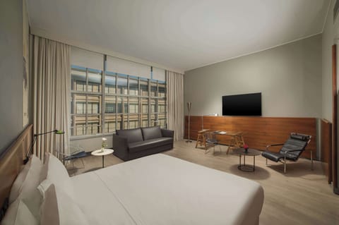 Hypo-allergenic bedding, down comforters, minibar, in-room safe