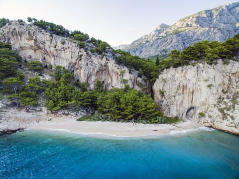 On the beach, beach cabanas, sun loungers, beach umbrellas
