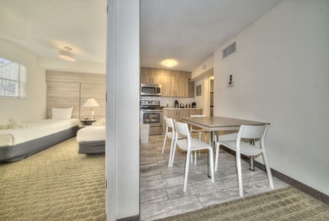 Deluxe Apartment, 2 Bedrooms | Living area | Flat-screen TV