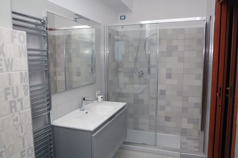 Panoramic Double Room, Sea View | Bathroom | Shower, hair dryer, bidet, towels