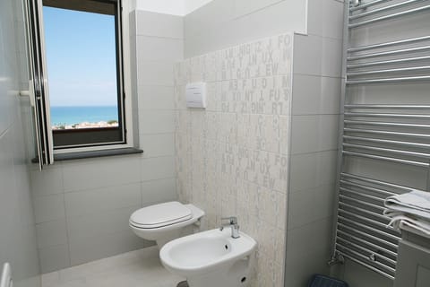 Panoramic Double Room, Sea View | Bathroom | Shower, hair dryer, bidet, towels