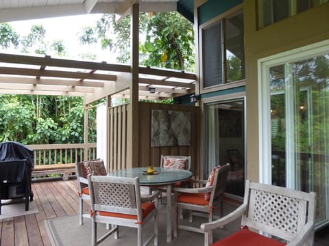 Outside dining outside of main room on deck an grill