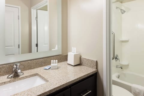 Studio, 2 Queen Beds | Bathroom | Combined shower/tub, hair dryer, towels