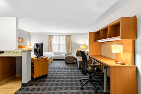 Suite, 1 Queen Bed, Non Smoking | Desk, iron/ironing board, free cribs/infant beds, free WiFi