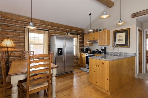 Full kitchen with stainless appliances, granite counters.