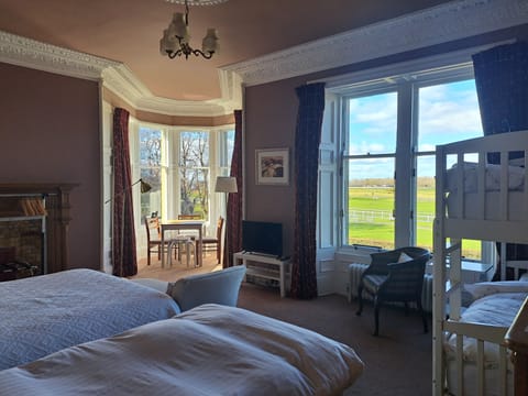 Family Room, Multiple Beds, Golf View | Individually decorated, individually furnished, blackout drapes
