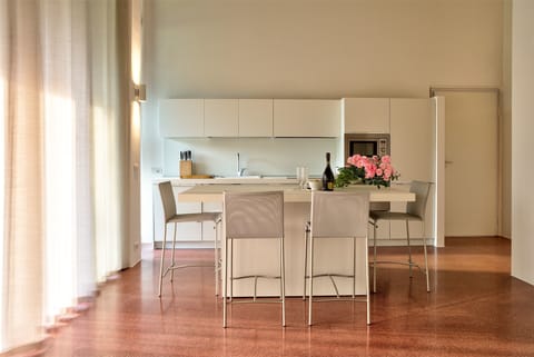 Exclusive Apartment, 2 Bedrooms, Accessible, Garden View (Ninfea) | Private kitchen | Fridge, microwave, oven, stovetop