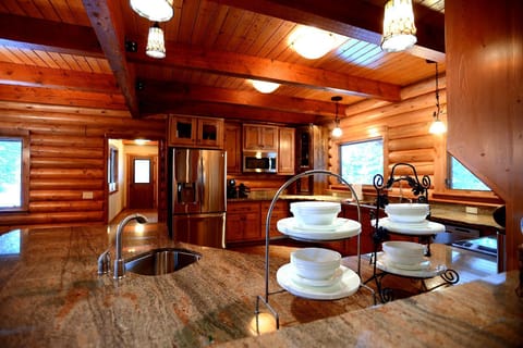 Large kitchen fully stocked with room for several cooks.