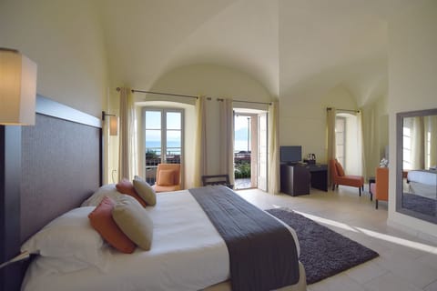 Deluxe Suite, Sea View, Ground Floor | Hypo-allergenic bedding, minibar, in-room safe, desk