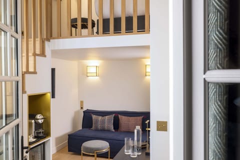 Duplex Jardin Prive | Minibar, in-room safe, desk, laptop workspace