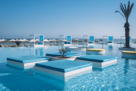 Indoor pool, 2 outdoor pools, pool umbrellas, sun loungers