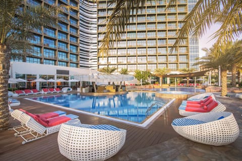 Outdoor pool, open 7:00 AM to 8:00 PM, pool umbrellas, sun loungers