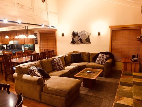 Main level living room sectional couch w/   full-size pull out sleeper in center