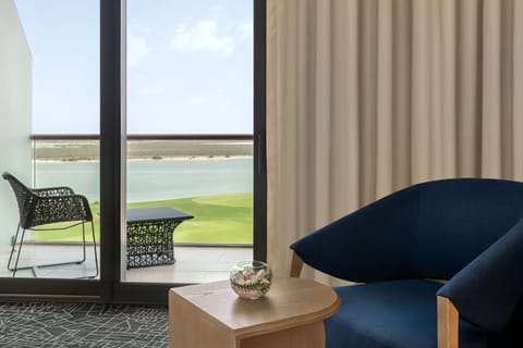 1 King Deluxe Family Suite Sea View Sofa Bed Balcony Theme Park Access | Down comforters, Select Comfort beds, minibar, in-room safe