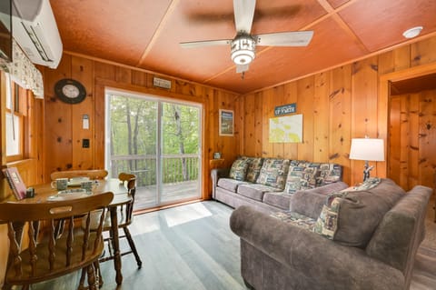 Carp Lake Vacation Rental | 2BR | 1BA | 4 Steps for Entry | 550 Sq Ft