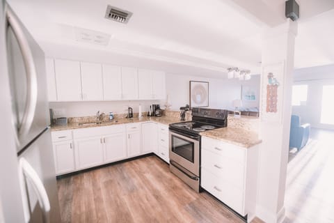 Updated kitchen with all the small appliances, dishes, and cookware you need