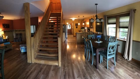 Open concept plan and open craftsman stairs to enhance entertainment. 