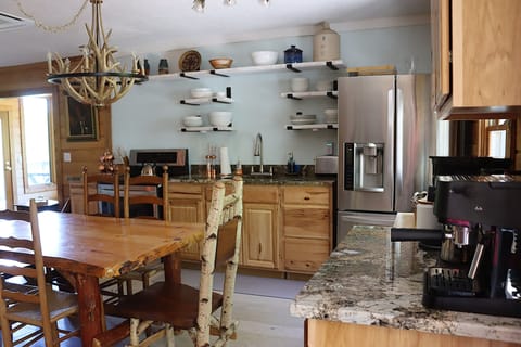 Fully stocked kitchen and coffee bar for the chefs in the family.