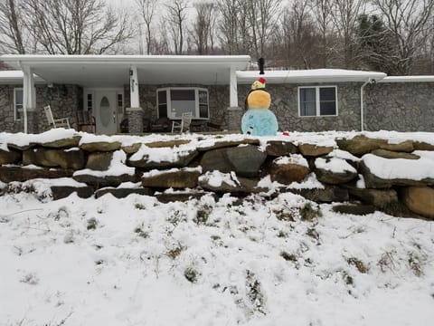 Front of the house with colored snowman
