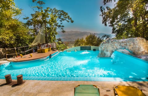 Seasonal outdoor pool, open 9 AM to 10 PM, sun loungers