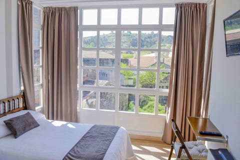 Double or Twin Room | Desk, blackout drapes, free cribs/infant beds, free WiFi