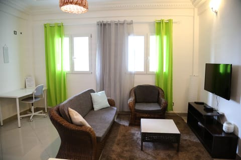 Comfort Double Room (Le Point Depart) | Living area | Plasma TV