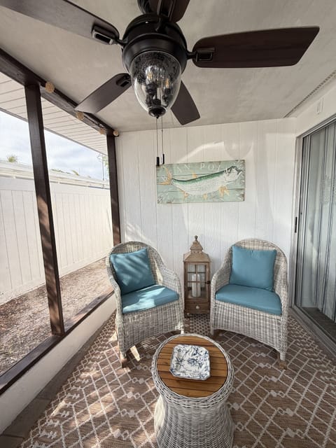 Screened in lanai with rockers.