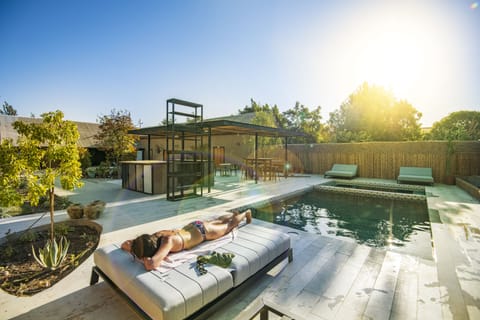 Outdoor pool, open 10:00 AM to 9:30 PM, pool umbrellas, sun loungers