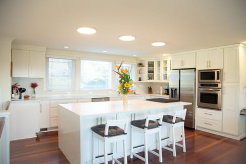 Kitchen #1 Upstairs with stove, oven, fridge, and coffee maker