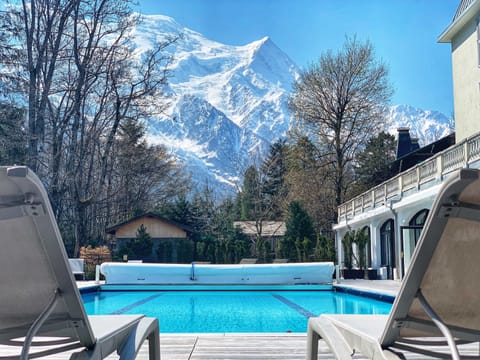 Outdoor pool, open 10 AM to 8 PM, sun loungers