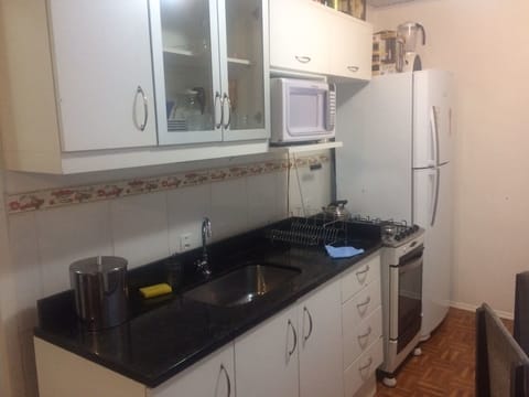 Cottage | Private kitchenette | Fridge, microwave, oven, cookware/dishes/utensils
