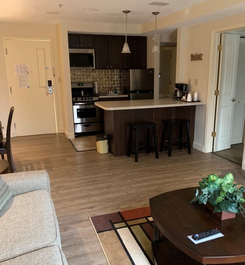 Deluxe Suite 2 Double Beds | Living area | 55-inch Smart TV with cable channels, TV