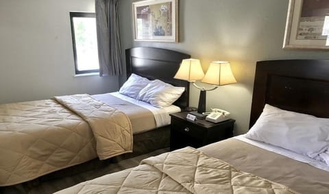 Traditional Double or Twin Room, 2 Double Beds | Individually furnished, desk, blackout drapes, iron/ironing board